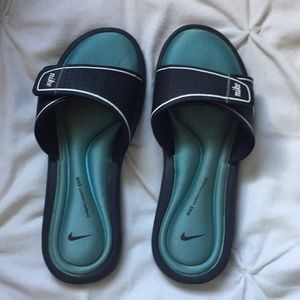 Blue Nike comfort footbed slides